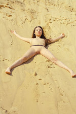 Martina is naked in the deep sand-08