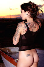 Tattooed Kayla Jane Strips Outdoors-11