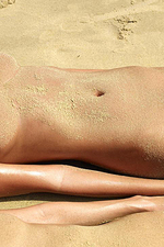 Pierced princess Krista is naked on the beach-01