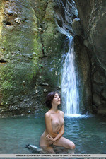 Naked babe by the waterfall-04