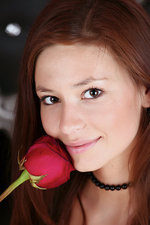 Naked redhead teen with a rose-05
