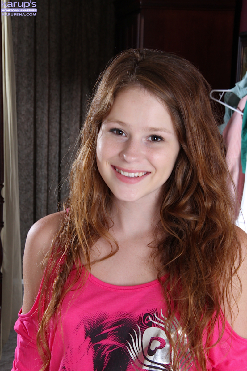 Teen redhead shows her tattoos-00