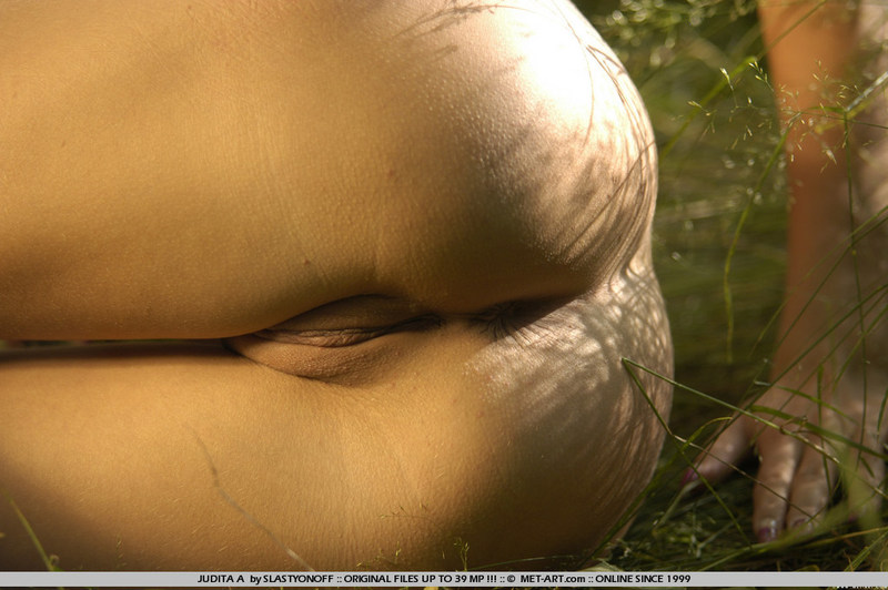 Naked teen spreads her pussy in the woods-15