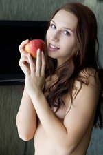 Naked redhead with her favorite fruit-17