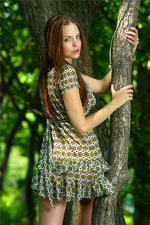 Amelie getting naked in an emerald forest-01