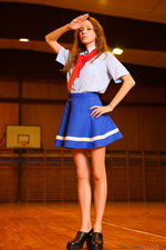 Young naked girl wearing blue mini skirt-01