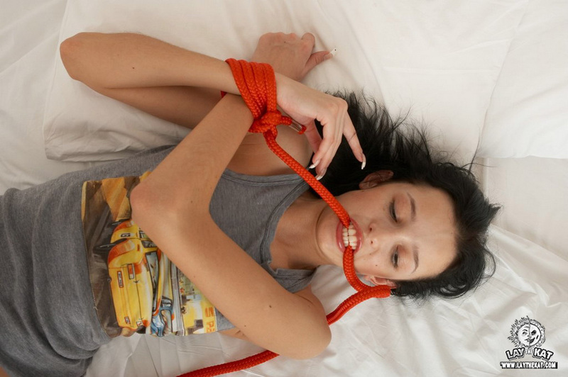 Black haired young chick with tied hands-08