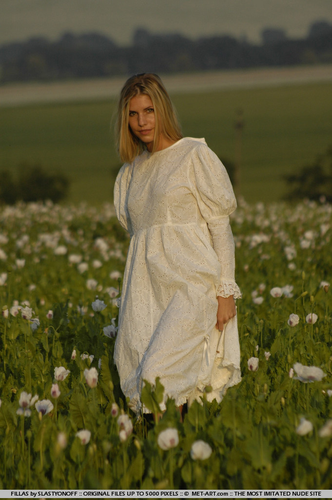 Petite blonde Iveta showing her amazing ass among flower-01