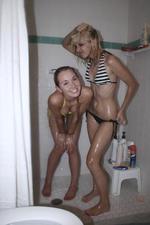 Wet and wild shower babes seductively posing-01