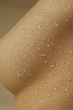 Naked girl takes a hot shower-00