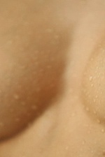 Naked girl takes a hot shower-09