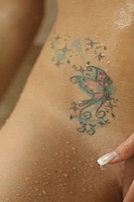 Naked girl takes a hot shower-11