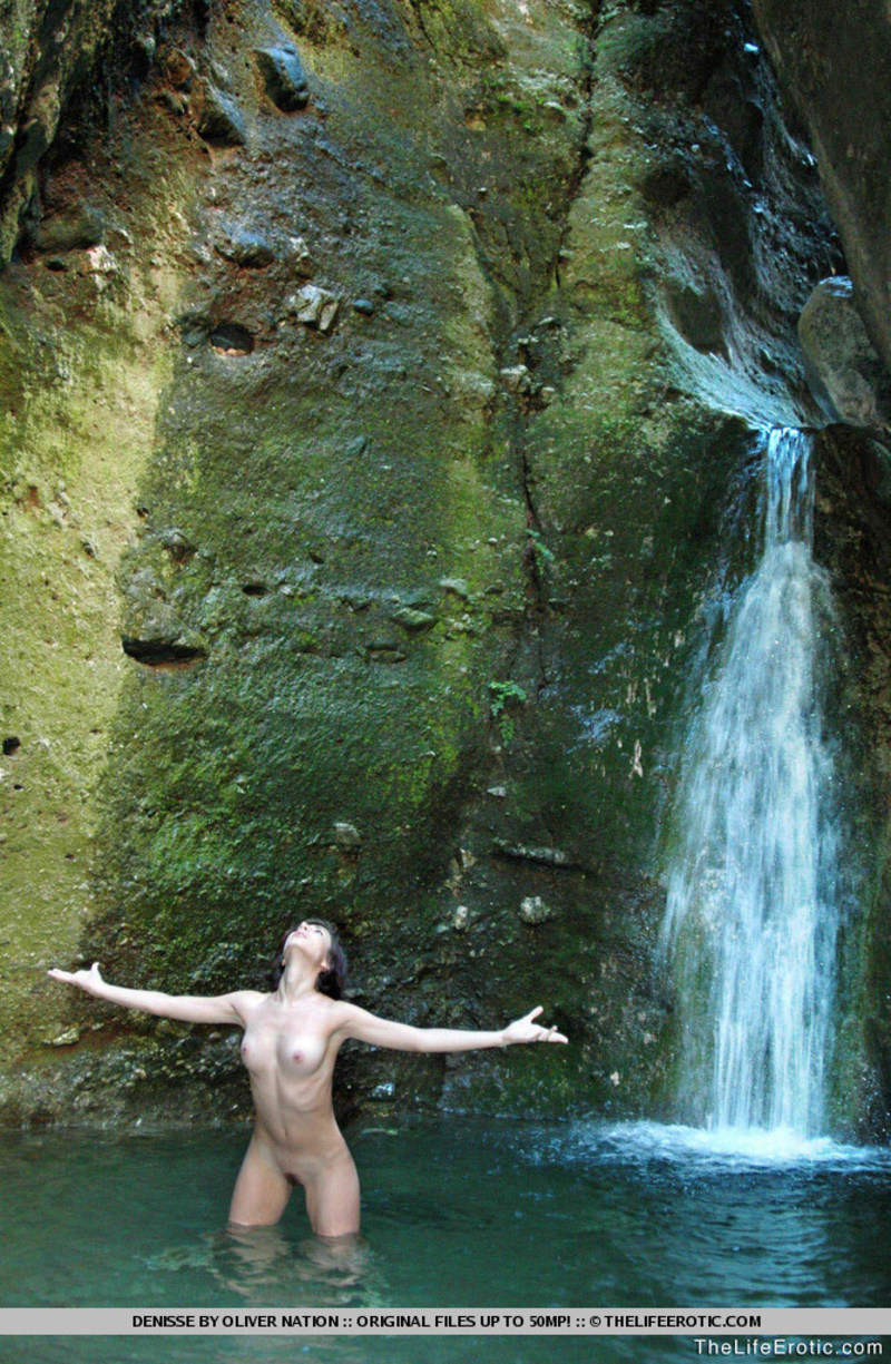 Naked babe by the waterfall-01