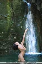 Naked babe by the waterfall-11
