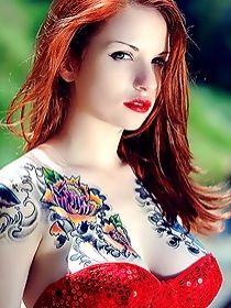 Redhead tattooed teen